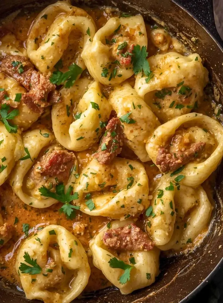 garlic steak tortellini in a pan
